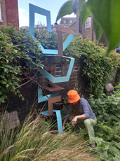 SPRING II  2022   230 x 63 x 48cm   Rusted steel, paint & fixings  Installed at St. John's Churchyard, Waterloo - as part of London Group exhibition
