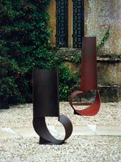 PIPE SERIES: RED OX (foreground) 112cm high Painted steel   PIPE DREAM (background) 164cm high Painted steel 1991-92 Private collection, UK