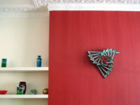 STAR LINE VI (red triangle)  2008   51cm wide x 47cm high x 17cm deep    Zinc coated & painted steel Private collection, UK